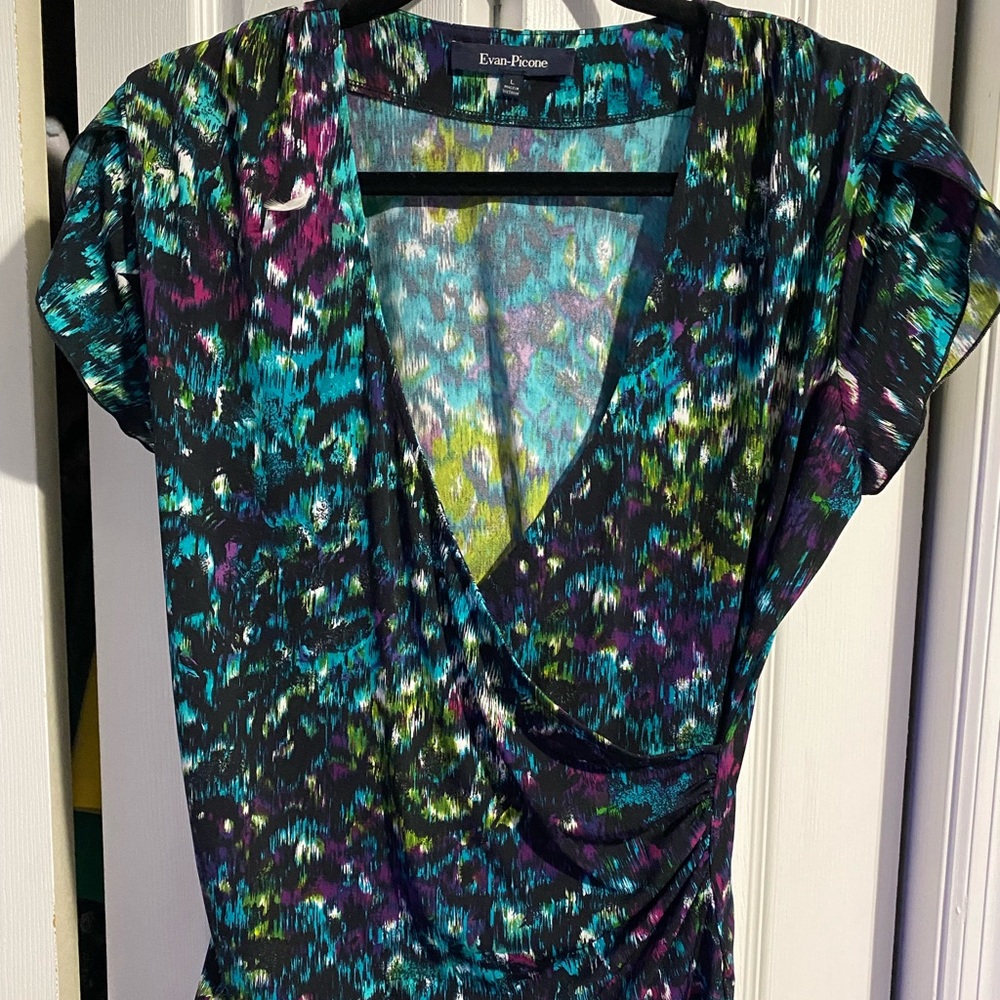 Woman’s multi colored blouse